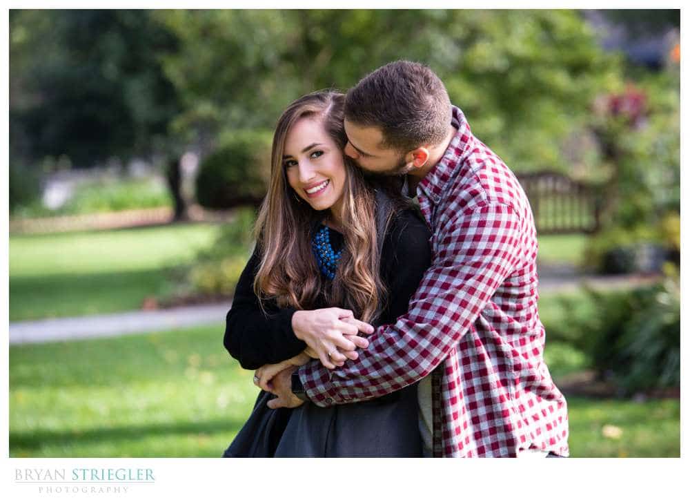 hugging her during engagement session